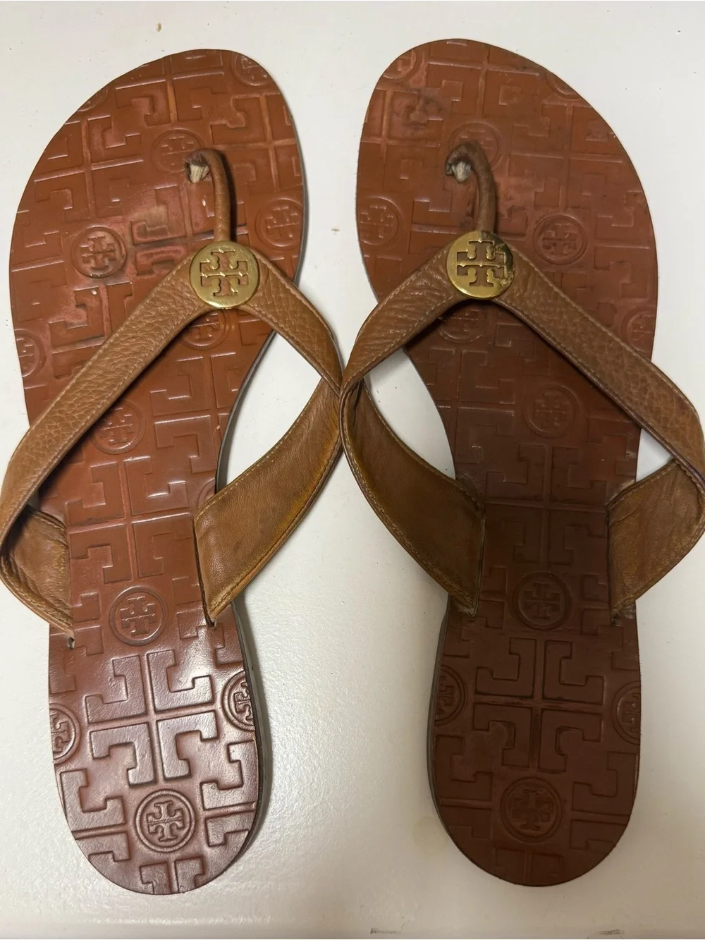 Tory Burch Black Leather and Brown Rubber Logo Flip Flop Sandals